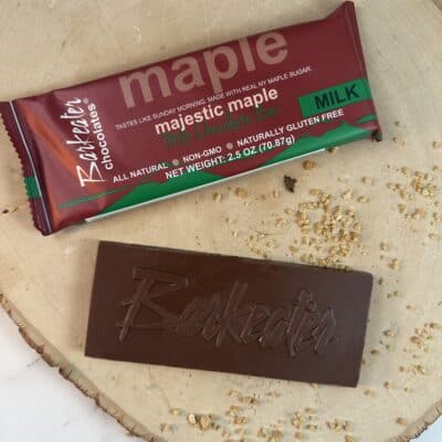 wrapped and unwrapped milk chocolate bar with maple sugar
