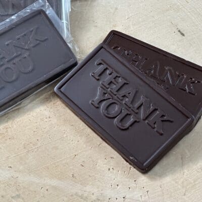 dark chocolate bars with the words "thank you" on them