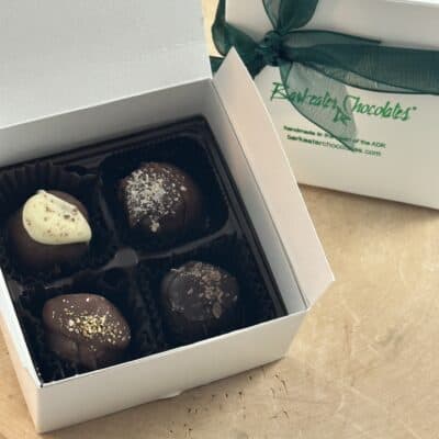 Open and closed four piece truffle box